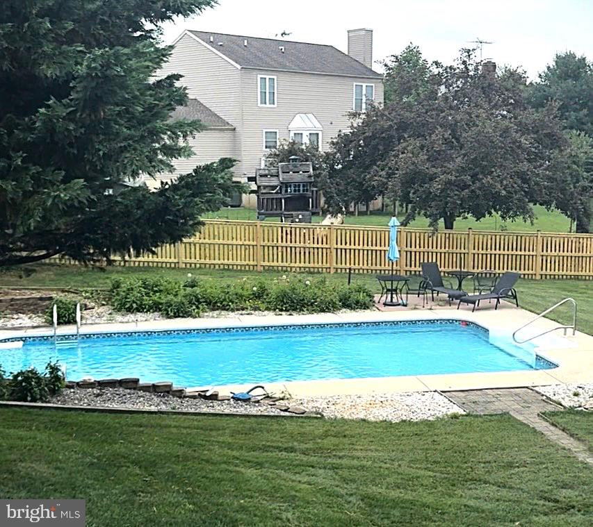 7 Coldstream Court Boonsboro, MD 21713 - Photo 38 of 43 a view of a house with a yard and swimming pool