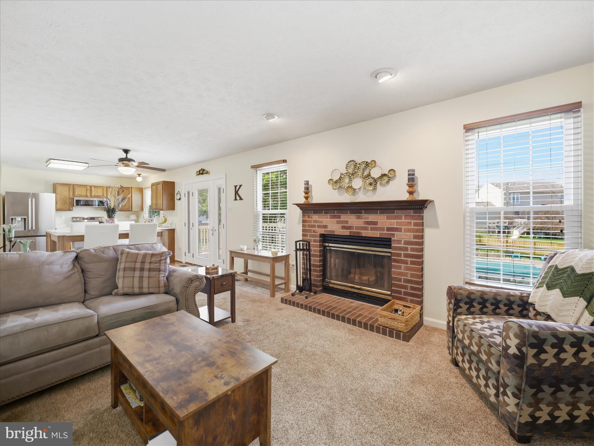 7 Coldstream Court Boonsboro, MD 21713 - Photo 9 of 43 a living room with furniture and a fireplace
