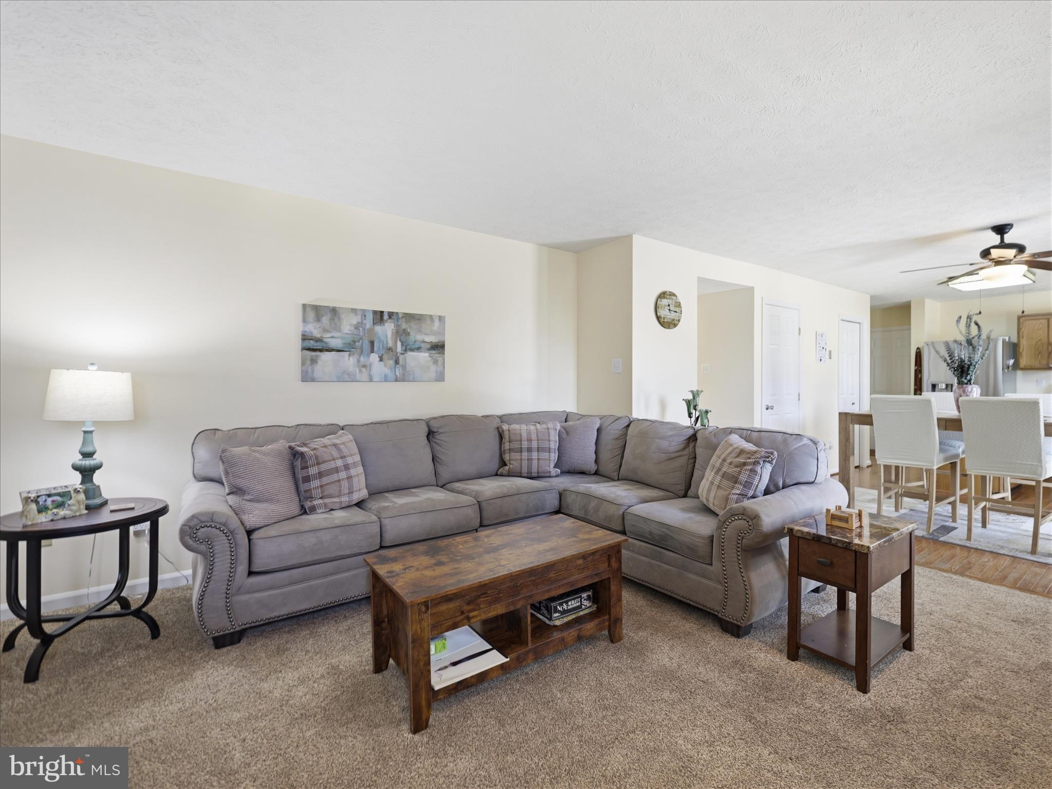 7 Coldstream Court Boonsboro, MD 21713 - Photo 10 of 43 a living room with furniture a lamp and a window