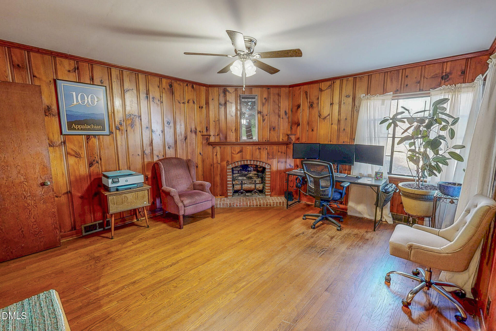 515 Reams Avenue Roxboro, NC 27573 - Photo 12 of 29 a living room with furniture and a fireplace