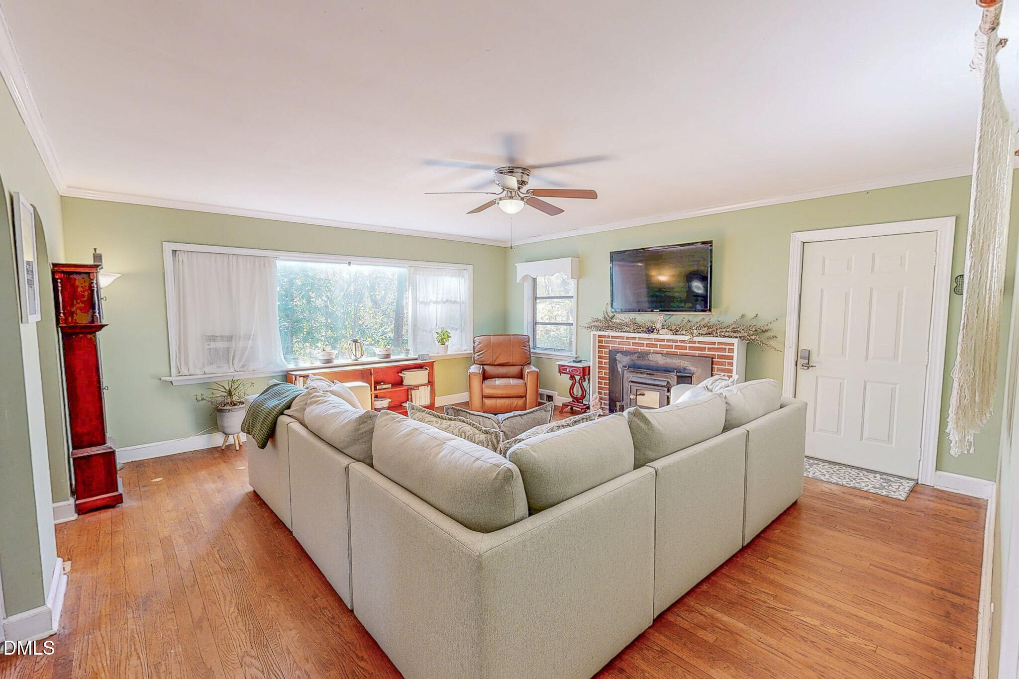 515 Reams Avenue Roxboro, NC 27573 - Photo 13 of 29 a living room with furniture and a fireplace