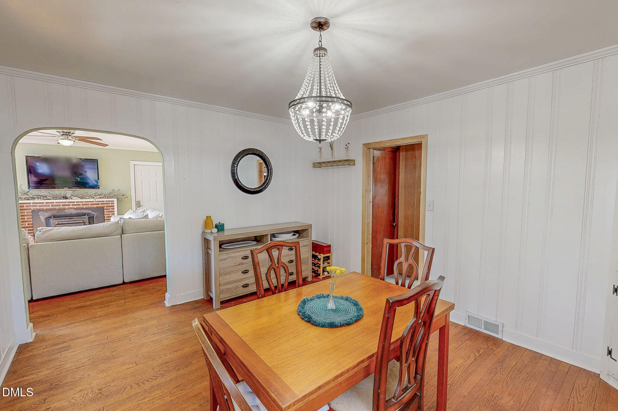 515 Reams Avenue Roxboro, NC 27573 - Photo 14 of 29 a view of a dining room with furniture and wooden floor