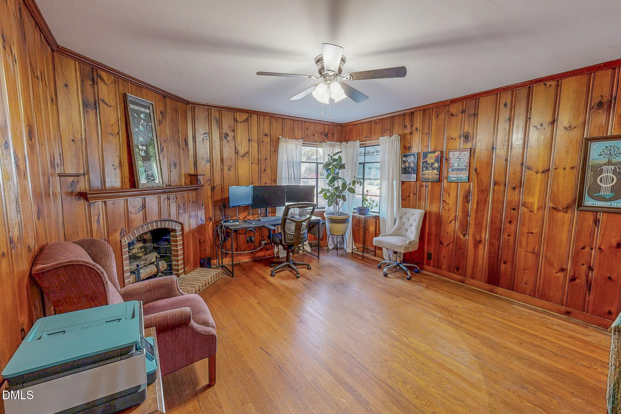 515 Reams Avenue Roxboro, NC 27573 - Photo 20 of 29 a living room with furniture a fireplace and large window