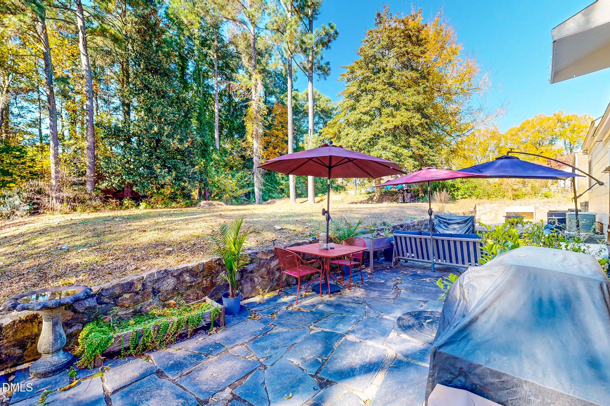 515 Reams Avenue Roxboro, NC 27573 - Photo 28 of 29 a view of a patio with furniture and a table