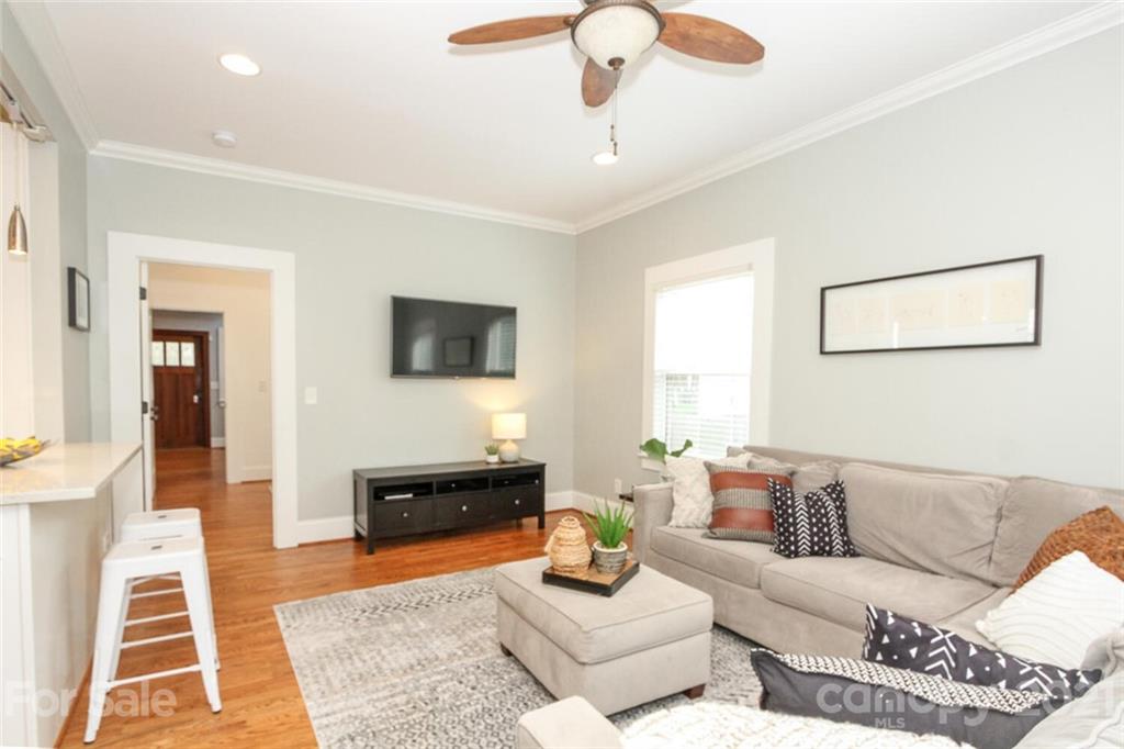 1637 Club Road Charlotte, NC 28205 - Photo 11 of 28 a living room with furniture and a flat screen tv