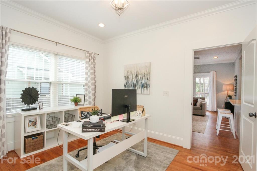1637 Club Road Charlotte, NC 28205 - Photo 12 of 28 a view of a livingroom with workspace and a window