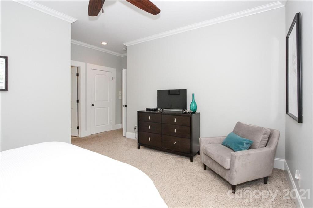 1637 Club Road Charlotte, NC 28205 - Photo 15 of 28 a bedroom with a bed and a couch