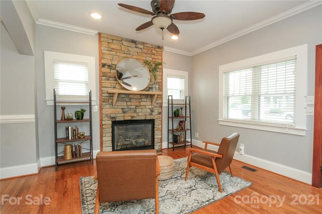 1637 Club Road Charlotte, NC 28205 - Photo 4 of 28 a living room with furniture a window and a fireplace