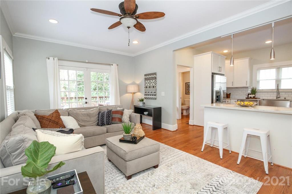 1637 Club Road Charlotte, NC 28205 - Photo 10 of 28 a living room with furniture and a large window