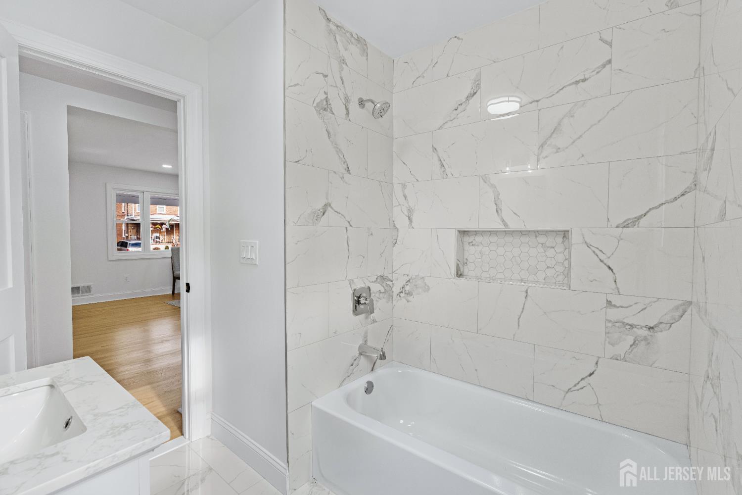 709 Front Street Dunellen, NJ 08812 - Photo 18 of 34 a bathroom with bathtub and shower