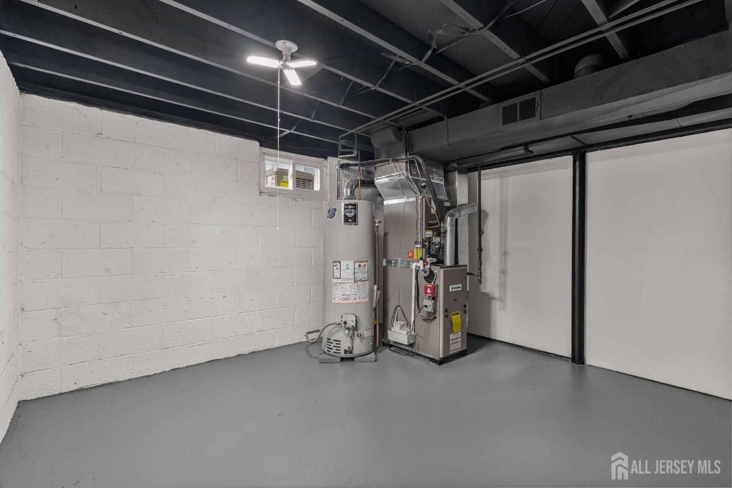 709 Front Street Dunellen, NJ 08812 - Photo 25 of 34 a view of storage and utility room