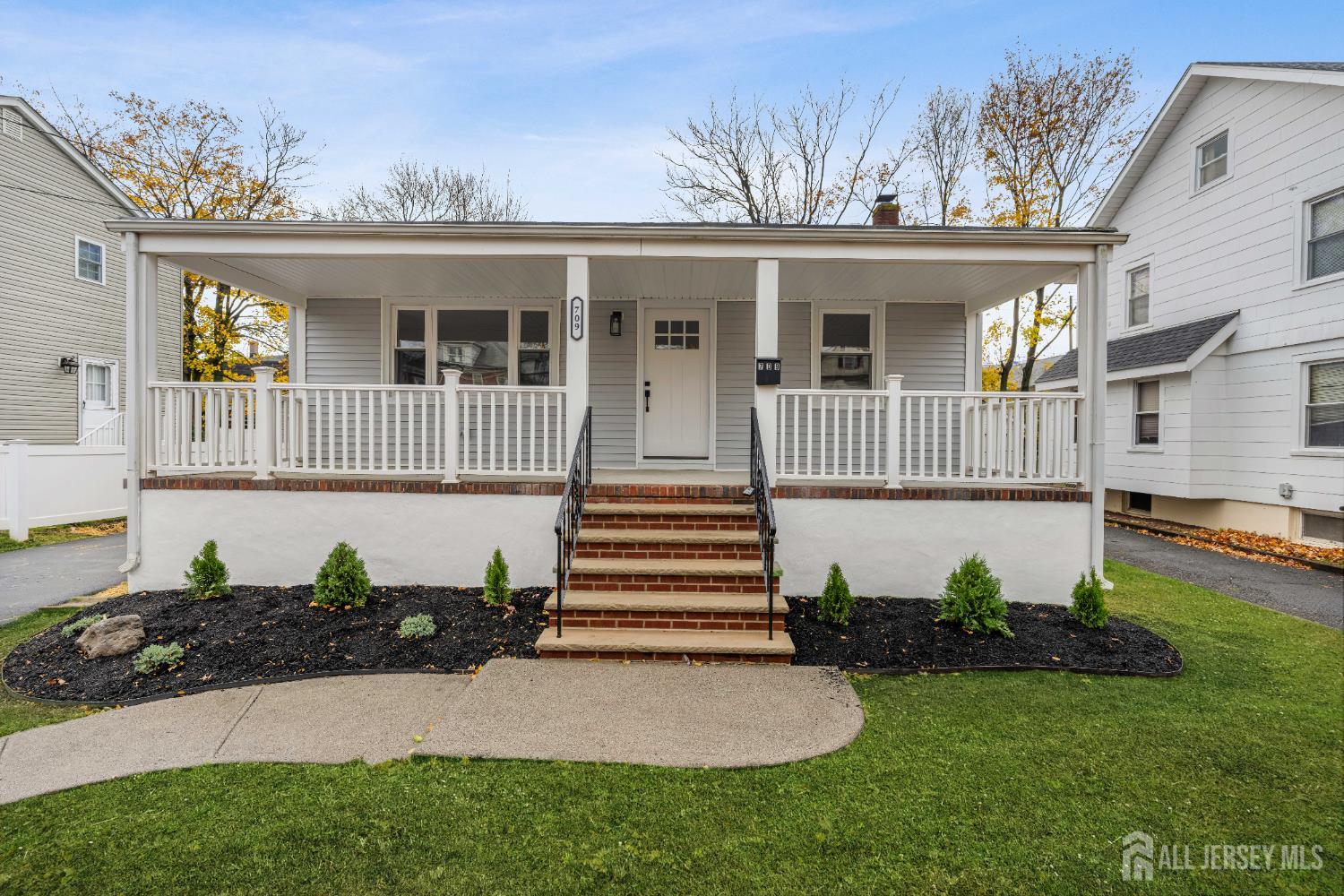 709 Front Street Dunellen, NJ 08812 - Photo 3 of 34 front view of a house