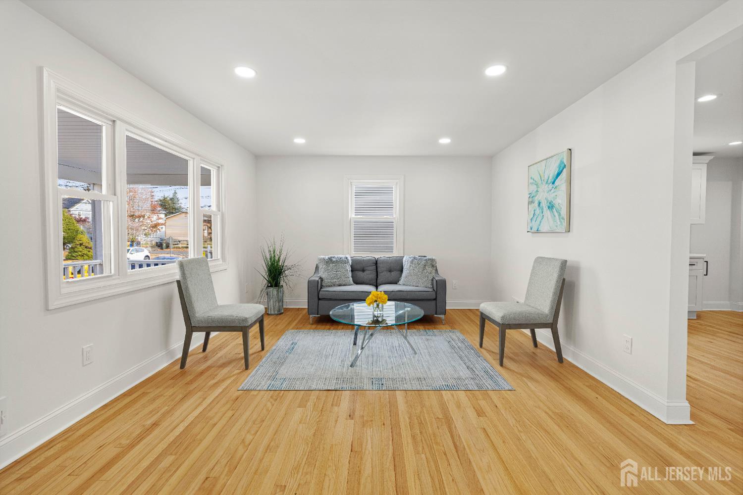 709 Front Street Dunellen, NJ 08812 - Photo 5 of 34 a living room with furniture and a wooden floor
