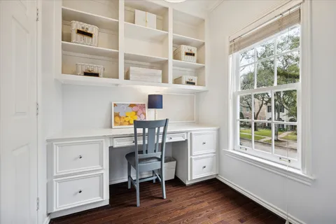 a view of a livingroom with furniture and window