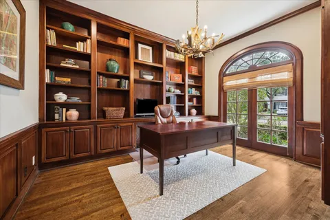 a swimming pool with outdoor seating and yard