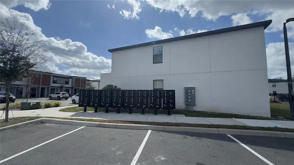 a kitchen with stainless steel appliances a stove top oven a sink and cabinets