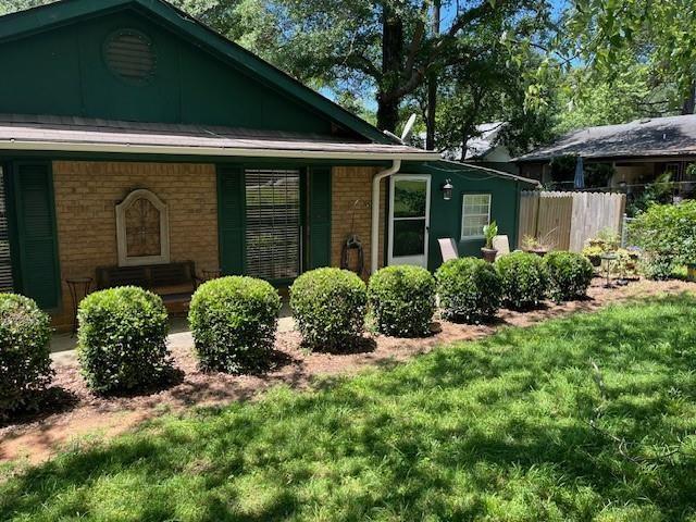 138 Manning Road Southwest Marietta, GA 30064 - Photo 3 of 14 front view of a house with a yard