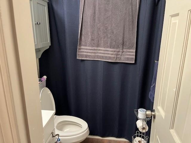 138 Manning Road Southwest Marietta, GA 30064 - Photo 7 of 14 a bathroom with a toilet and a mirror