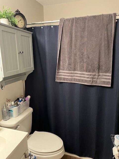 138 Manning Road Southwest Marietta, GA 30064 - Photo 8 of 14 a bathroom with a sink toilet and mirror