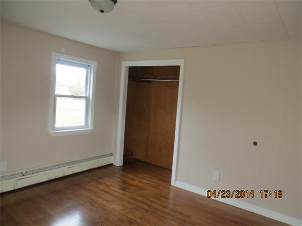 62 Chipaway Road Freetown, MA 02717 - Photo 13 of 14 a view of an empty room with wooden floor and a window
