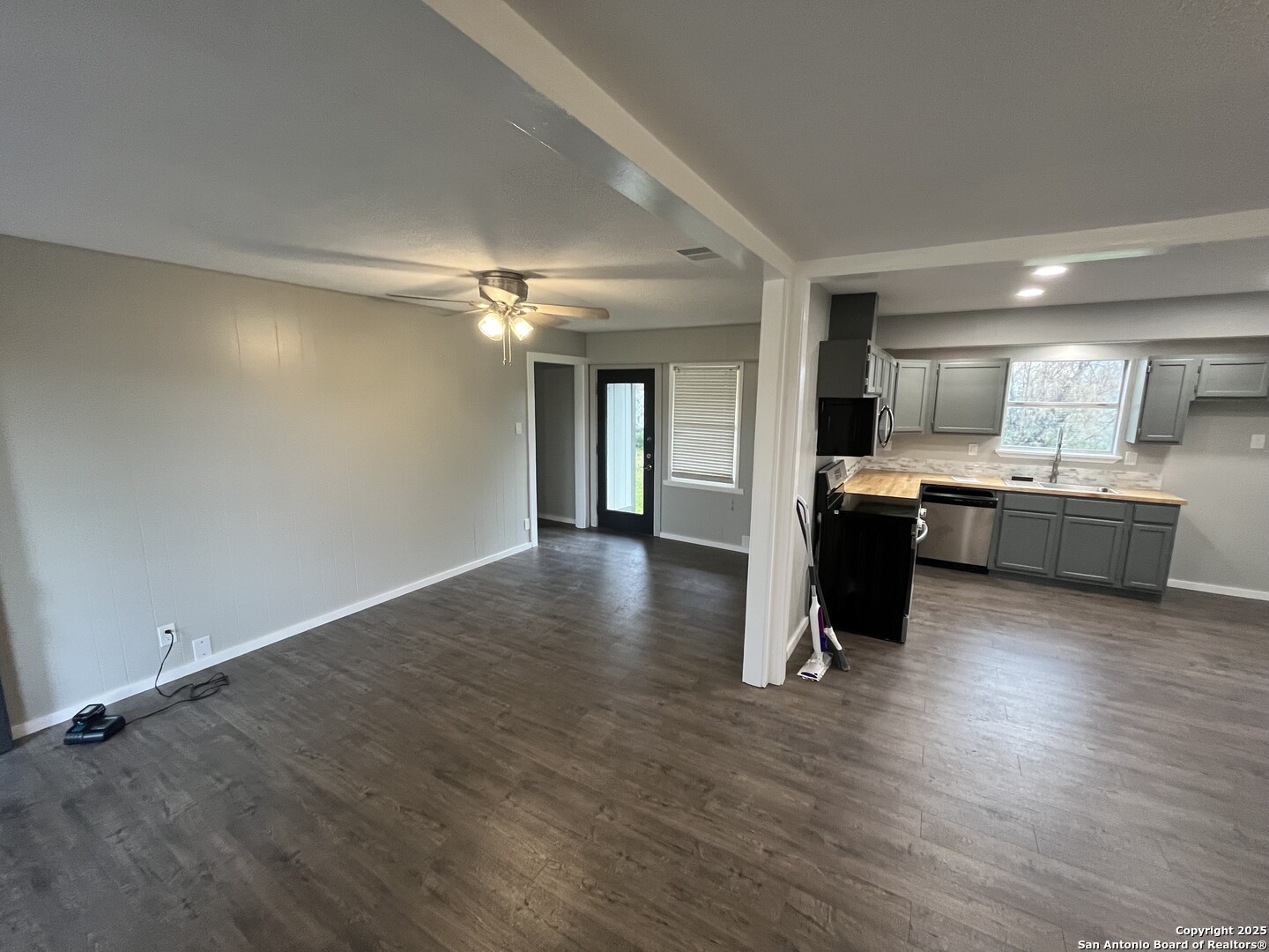 302 Ross Avenue Devine, TX 78016 - Photo 9 of 20 a view of kitchen with wooden floor