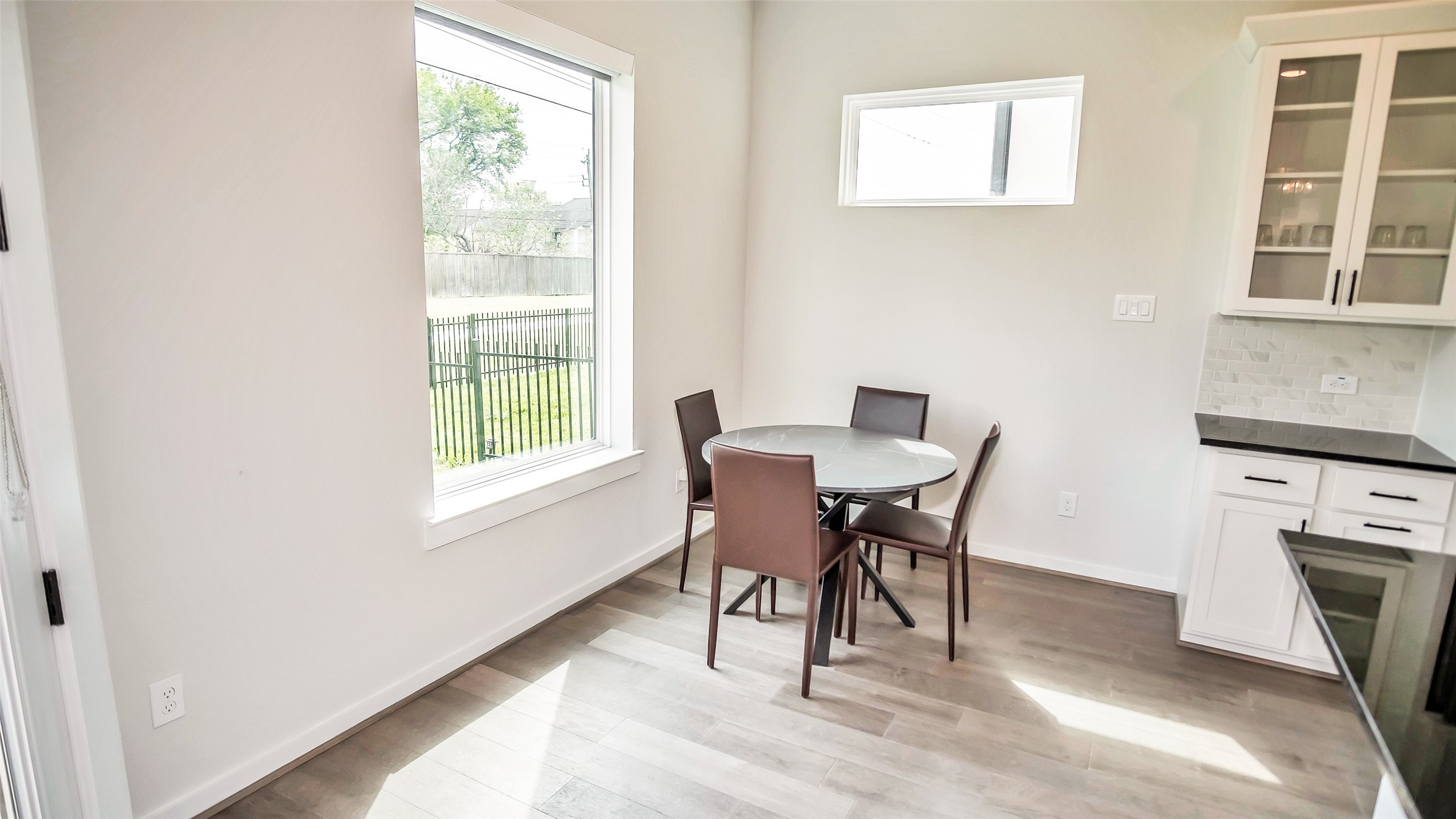 1919 Pueblo Nuevo Path Houston, TX 77077 - Photo 45 of 50 a dining room with furniture and a window