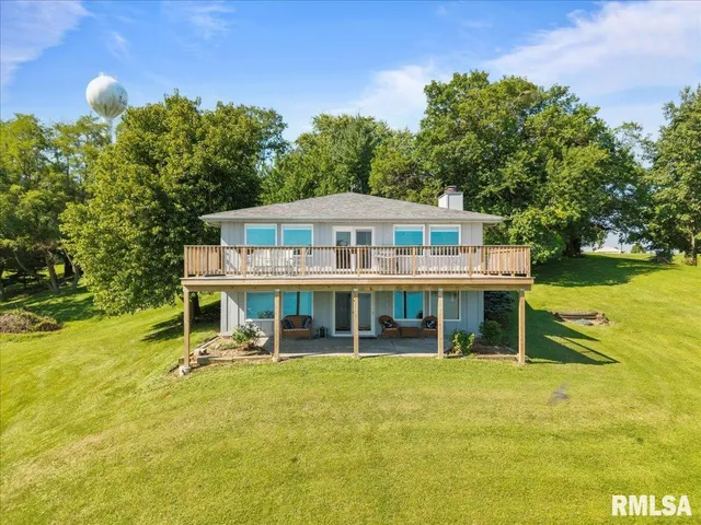 a view of a house with swimming pool