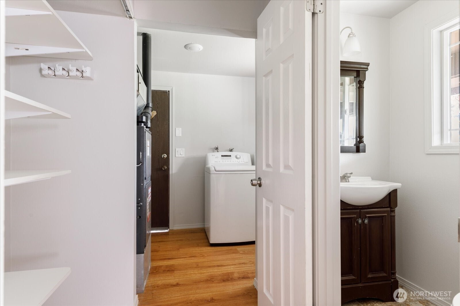 960 Southwest Capital Street Oak Harbor, WA 98277 - Photo 19 of 40 a bathroom with a sink a toilet and shower