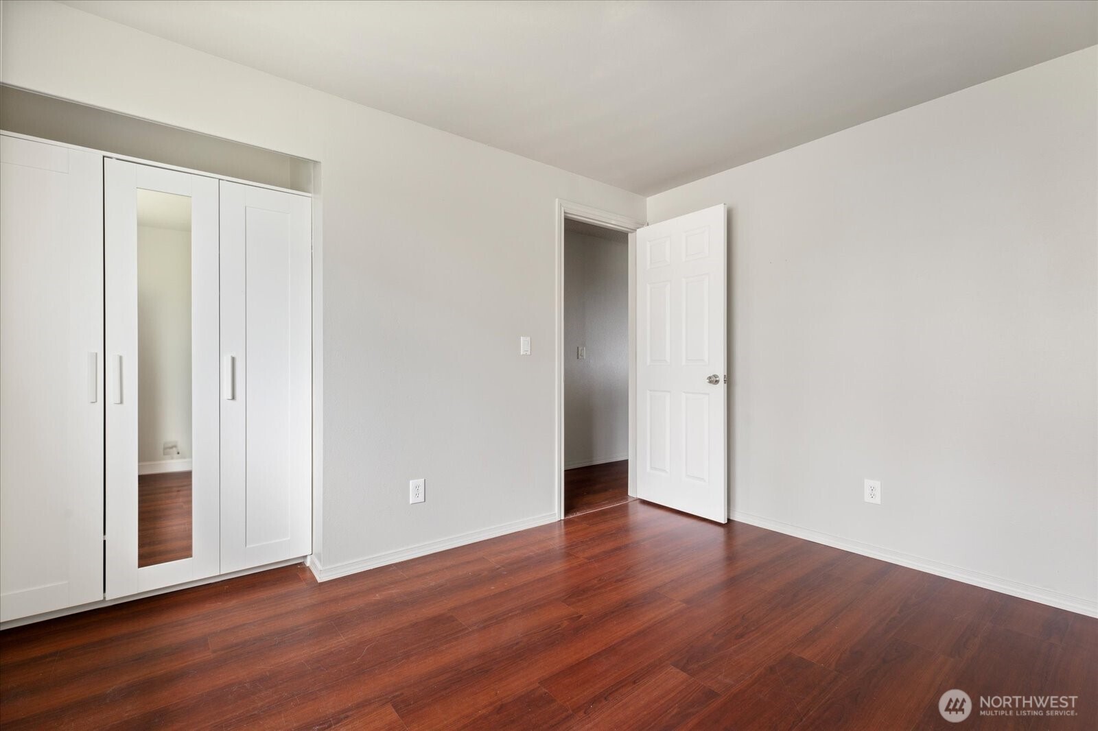 960 Southwest Capital Street Oak Harbor, WA 98277 - Photo 30 of 40 a view of an empty room with wooden floor