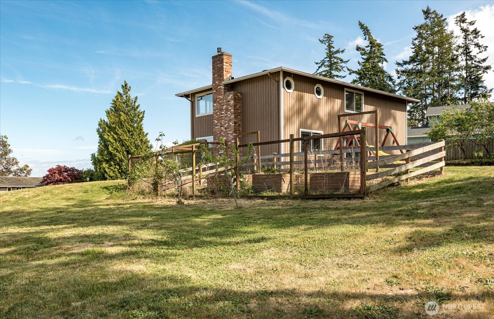 960 Southwest Capital Street Oak Harbor, WA 98277 - Photo 32 of 40 a view of a house with a yard