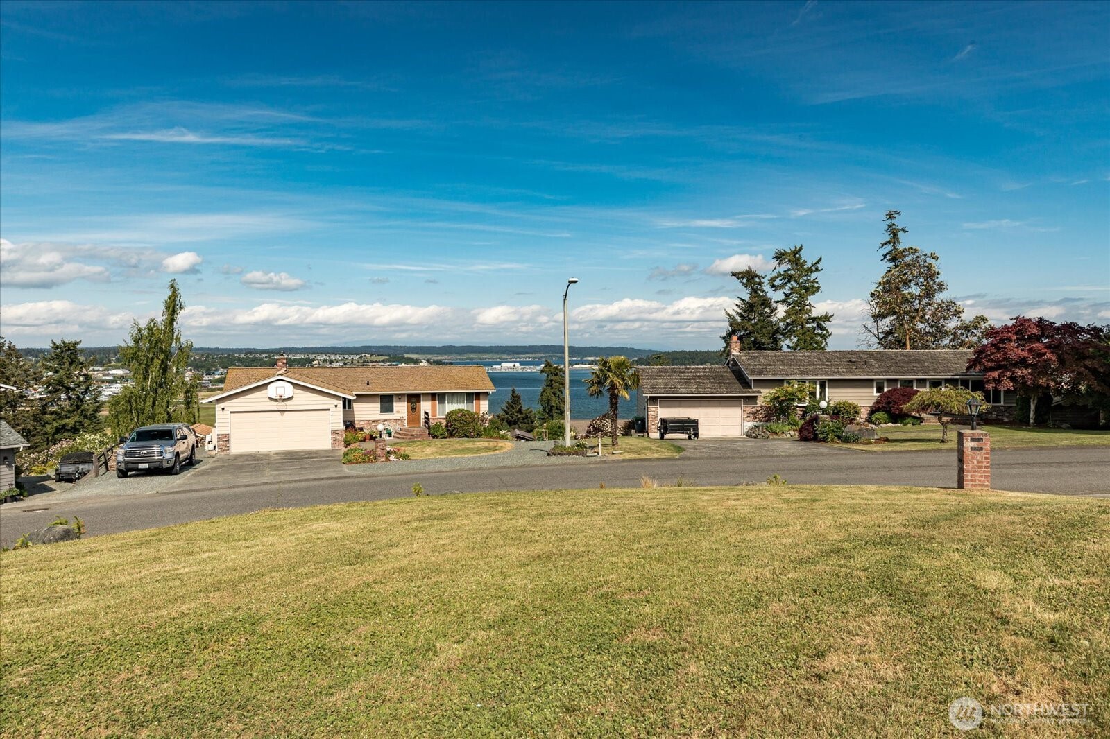 960 Southwest Capital Street Oak Harbor, WA 98277 - Photo 6 of 40 a view of a house and a yard