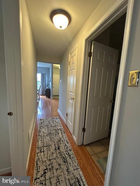 2007 Waterford Road Yardley, PA 19067 - Photo 20 of 44 a view of a hallway with wooden floor and a bathroom