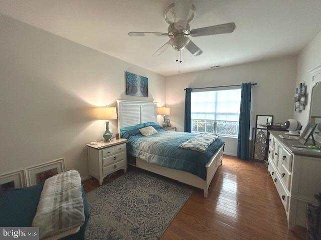 2007 Waterford Road Yardley, PA 19067 - Photo 23 of 44 a spacious bedroom with a large bed a chandelier and windows