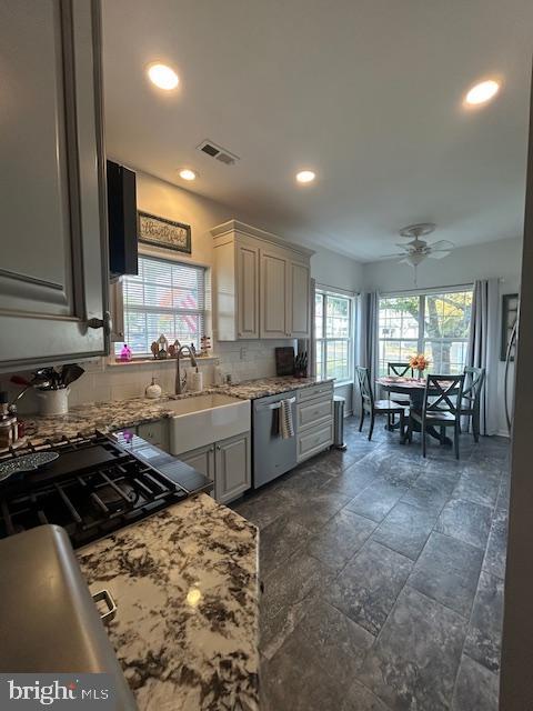 2007 Waterford Road Yardley, PA 19067 - Photo 8 of 44 a kitchen with stainless steel appliances granite countertop a sink stove and cabinets