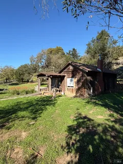 a view of a house with a big yard