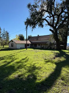 a view of a swimming pool with a garden
