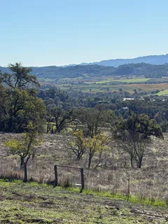 a view of a large mountain in the distance