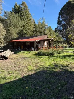 a view of a house with a big yard