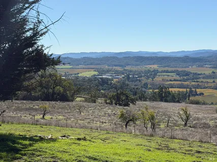 a view of a town with mountains