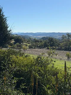 a view of a lake with mountains in the background