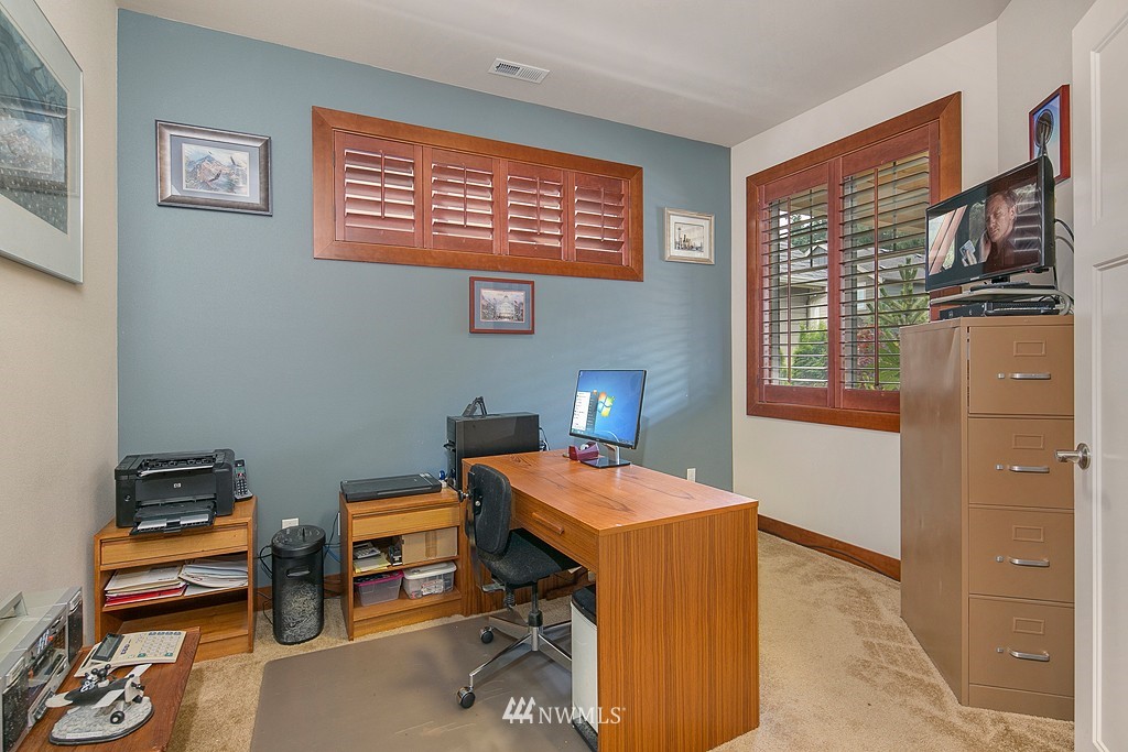 19809 3rd Avenue Southeast Bothell, WA 98012 - Photo 11 of 21 a view of a workspace with furniture and a window