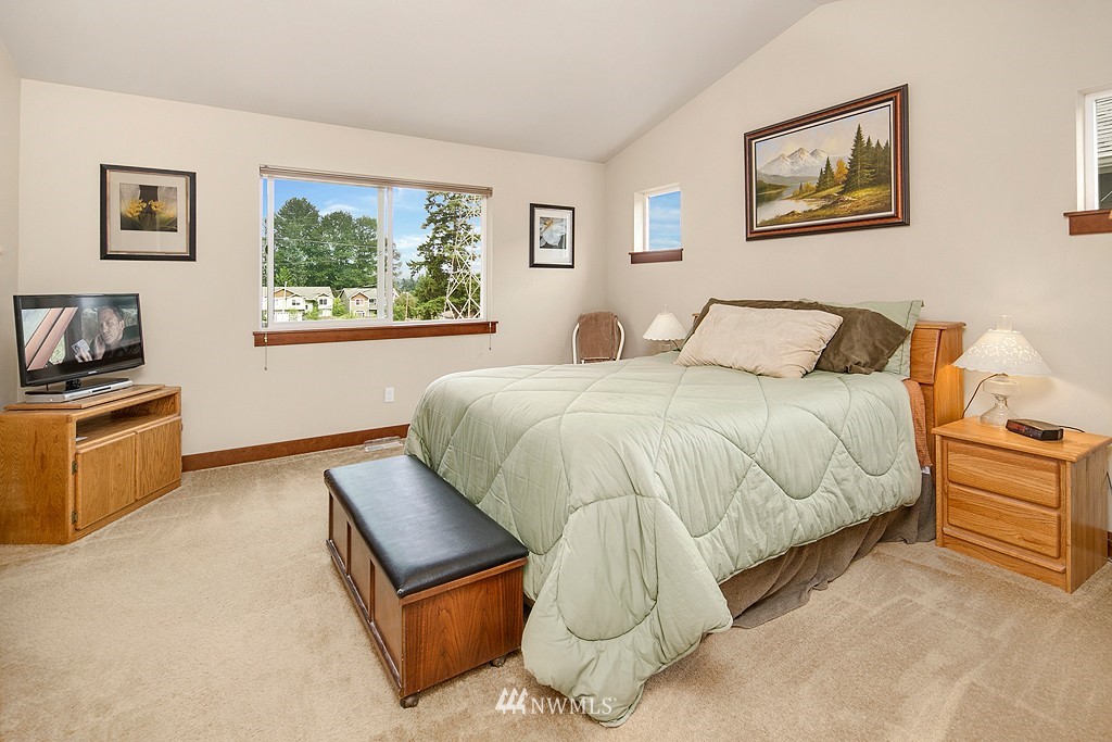 19809 3rd Avenue Southeast Bothell, WA 98012 - Photo 12 of 21 a bedroom with a bed and a cabinets