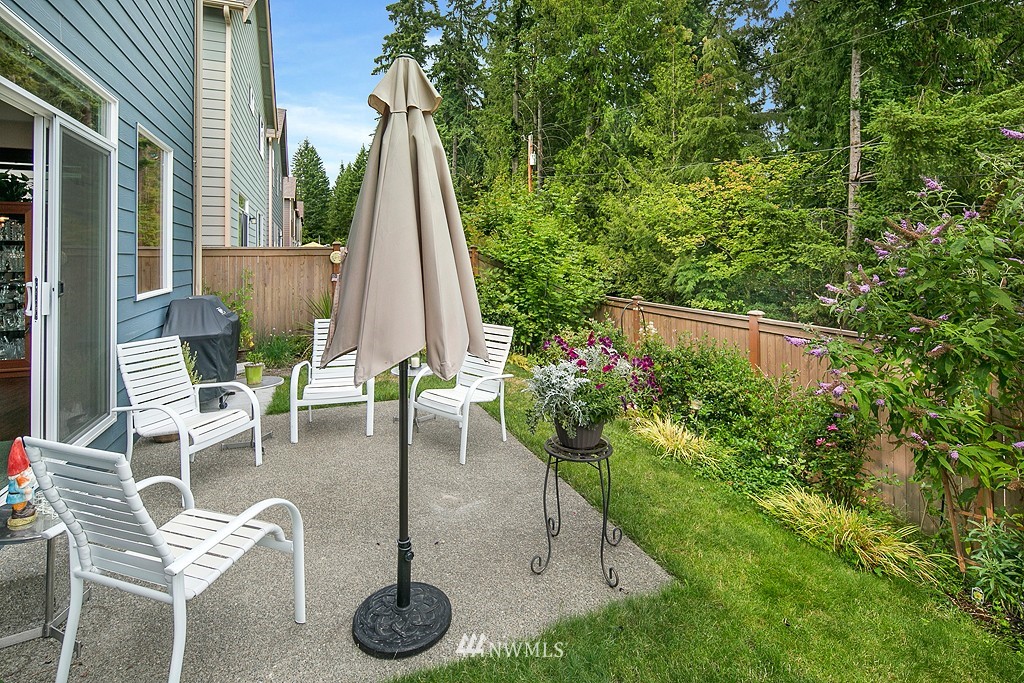 19809 3rd Avenue Southeast Bothell, WA 98012 - Photo 19 of 21 a view of backyard with swimming pool and outdoor seating