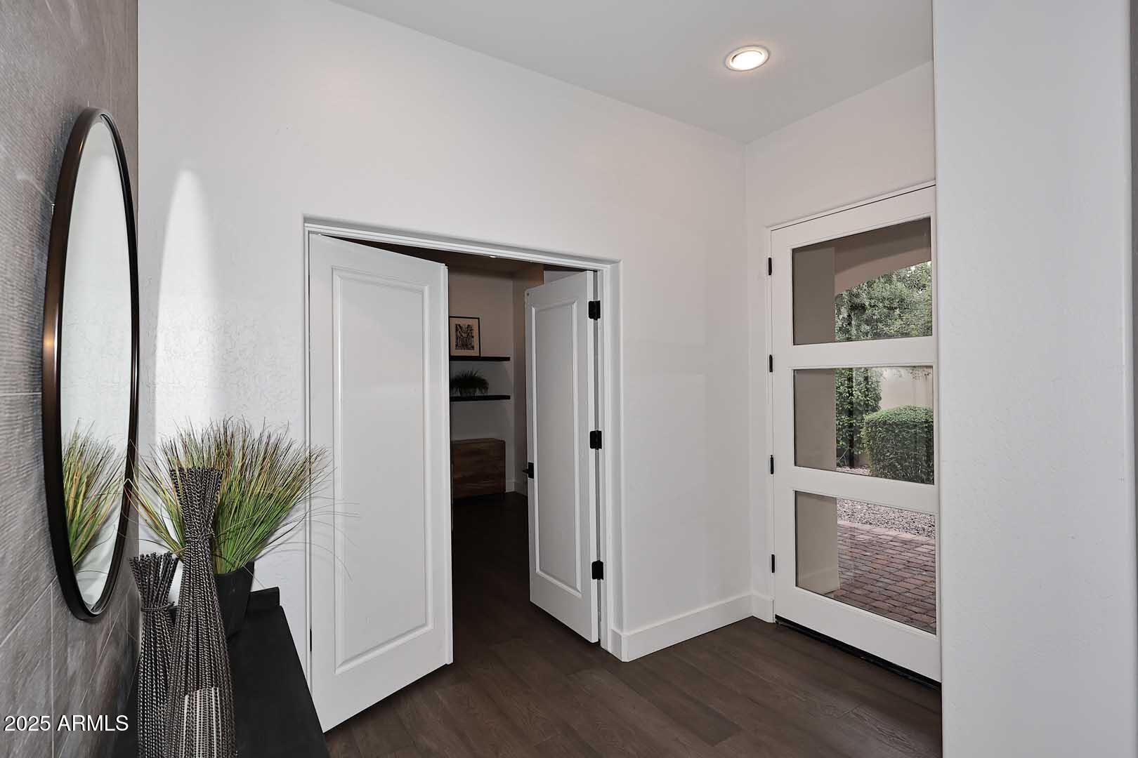 2979 South Lookout Ridge Gold Canyon, AZ 85118 - Photo 13 of 51 an entryway with wooden floor and front door