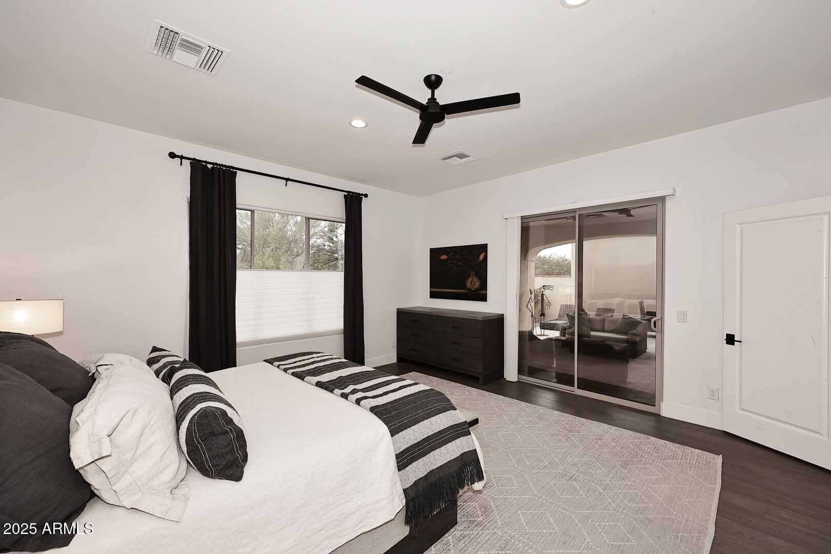 2979 South Lookout Ridge Gold Canyon, AZ 85118 - Photo 15 of 51 a bedroom with a bed and a large window