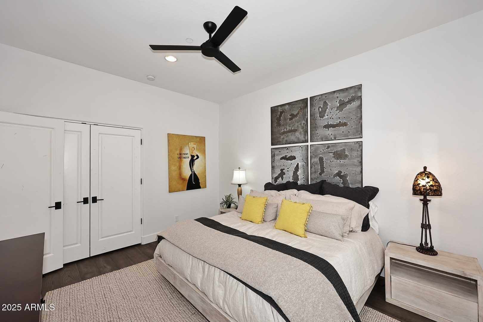 2979 South Lookout Ridge Gold Canyon, AZ 85118 - Photo 24 of 51 a bedroom with a bed and a chandelier