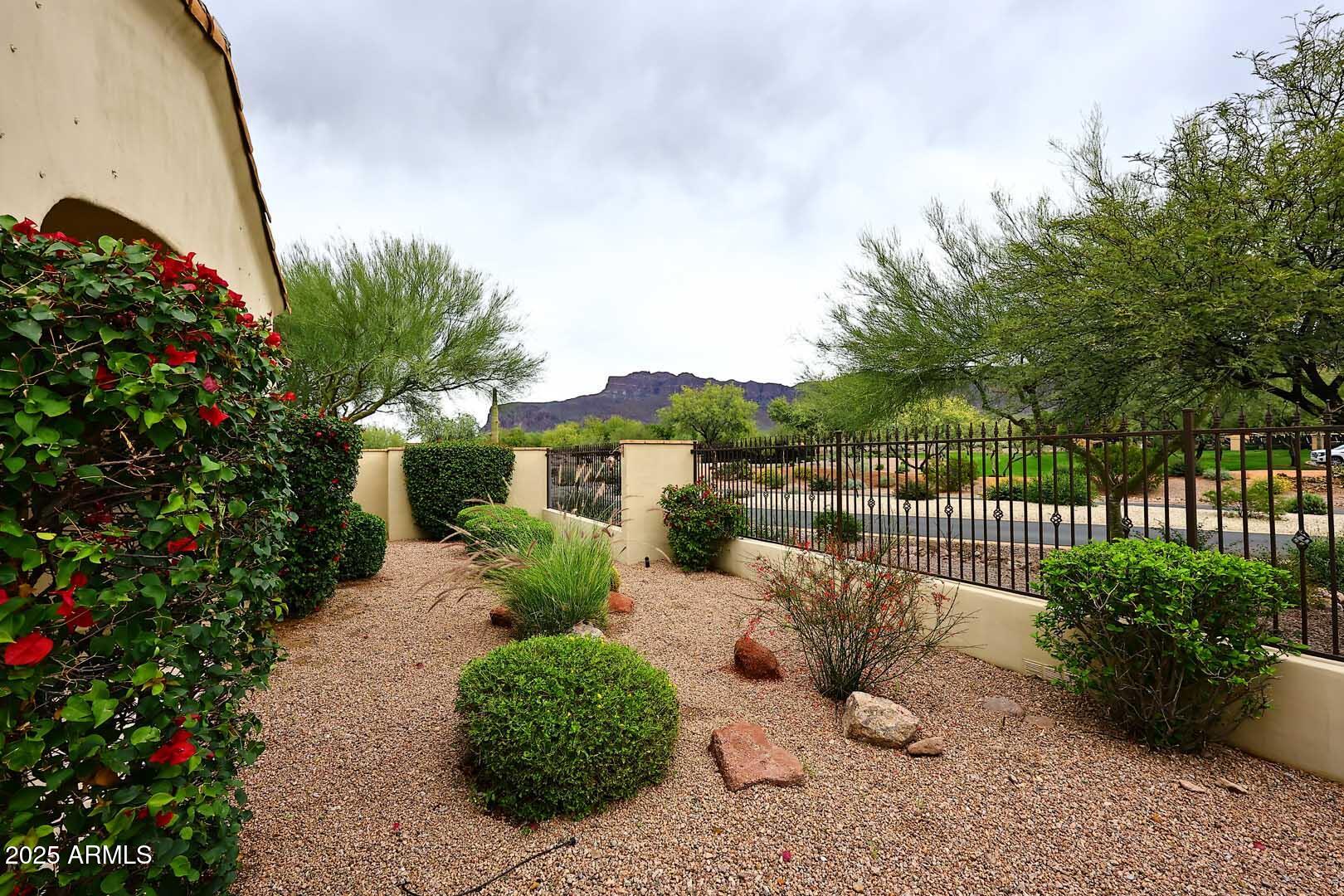 2979 South Lookout Ridge Gold Canyon, AZ 85118 - Photo 30 of 51 a view of a chair and table in the garden