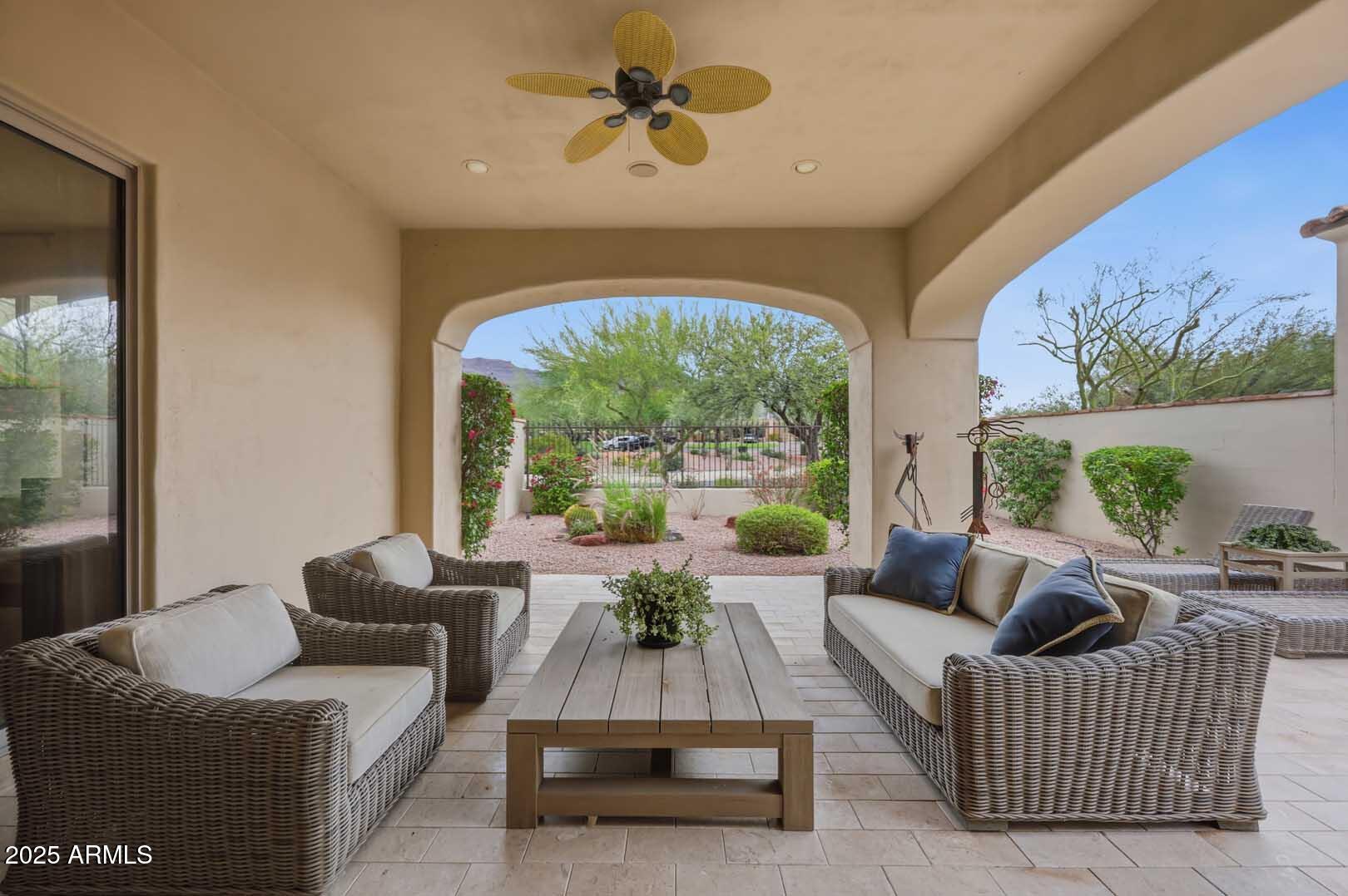 2979 South Lookout Ridge Gold Canyon, AZ 85118 - Photo 31 of 51 a living room with furniture and a large window