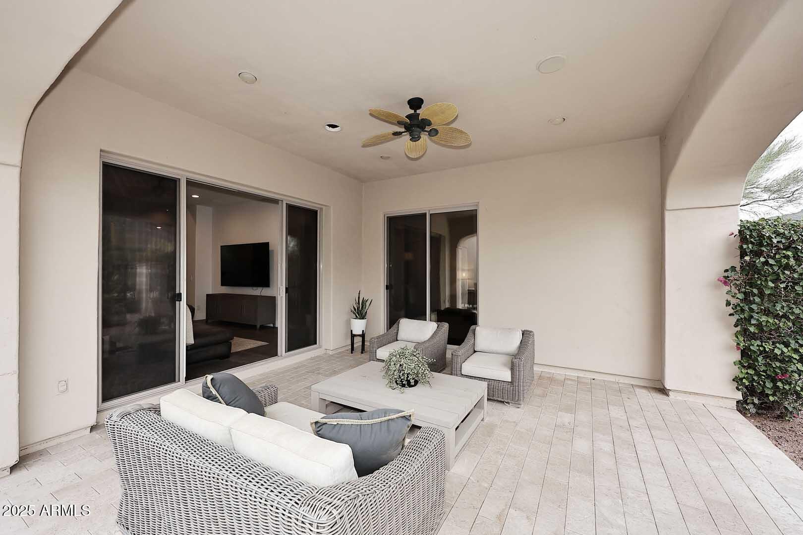 2979 South Lookout Ridge Gold Canyon, AZ 85118 - Photo 37 of 51 a living room with furniture and a large window