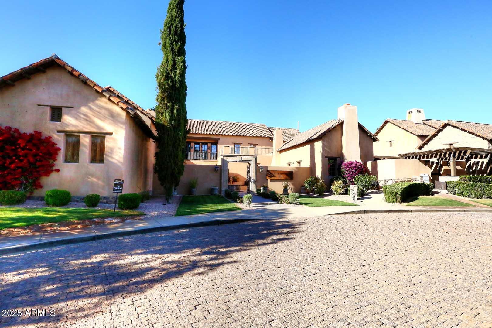 2979 South Lookout Ridge Gold Canyon, AZ 85118 - Photo 47 of 51 a street sign on a sidewalk next to a road